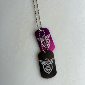 Pink and black dog tags